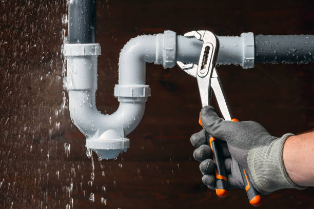 Professional Emergency Plumber technician working in Freeport, MN